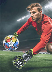 Youth goalkeeper gloves with adjustable wrist strap providing support and protection for young players